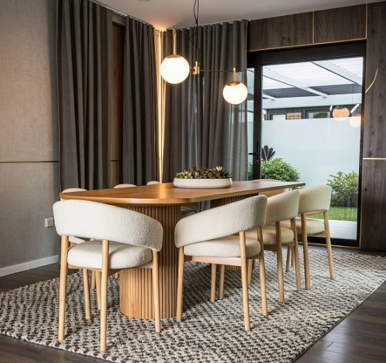 Elan – A contemporary 8-seater dining table that blends modern elegance with functional comfort.