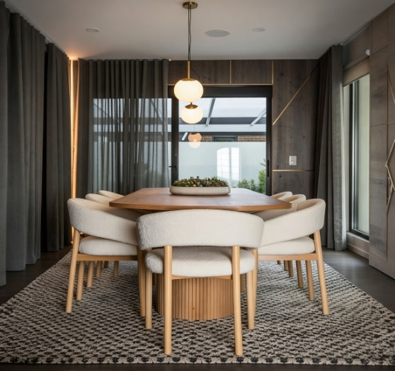 Elan – A contemporary 8-seater dining table that blends modern elegance with functional comfort.